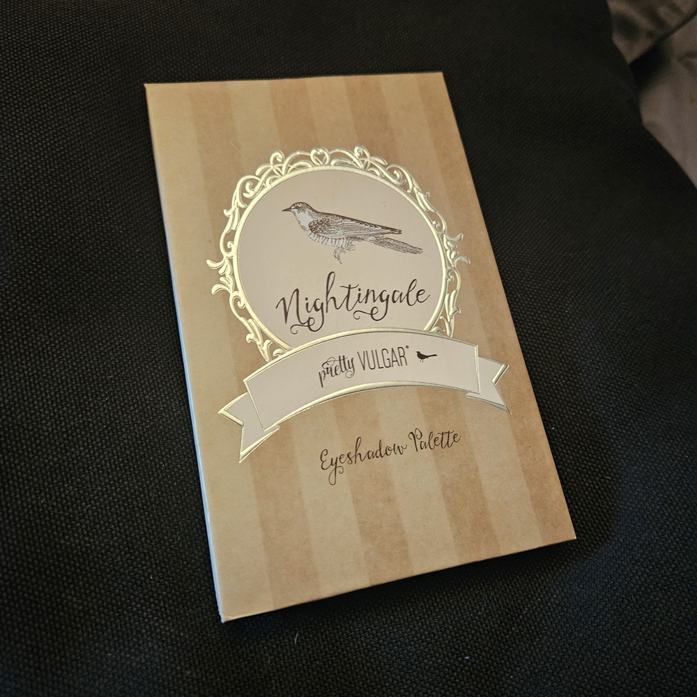 Pretty Vulgar Nightingale Eyeshadow Palette with Gold and Cream Design